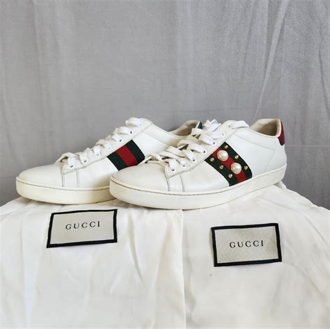 ace studded leather sneaker gucci price